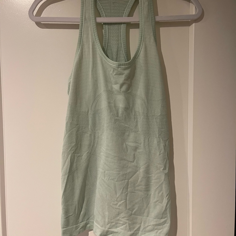 Swiftly Tech Racerback Tank Top
Hip Length (mint)
